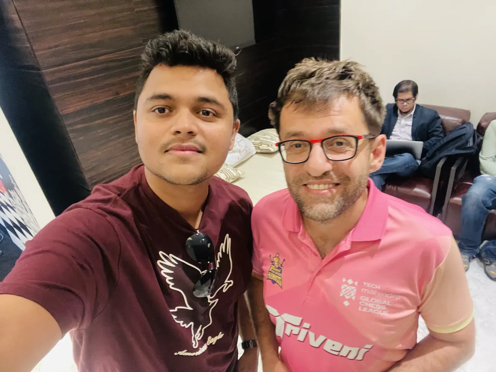 Two chess players discussing a game together